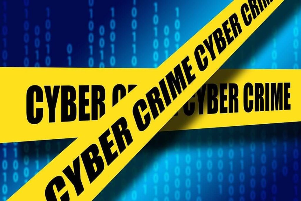 Gráfica con cinta de advertencia de cibercrimen